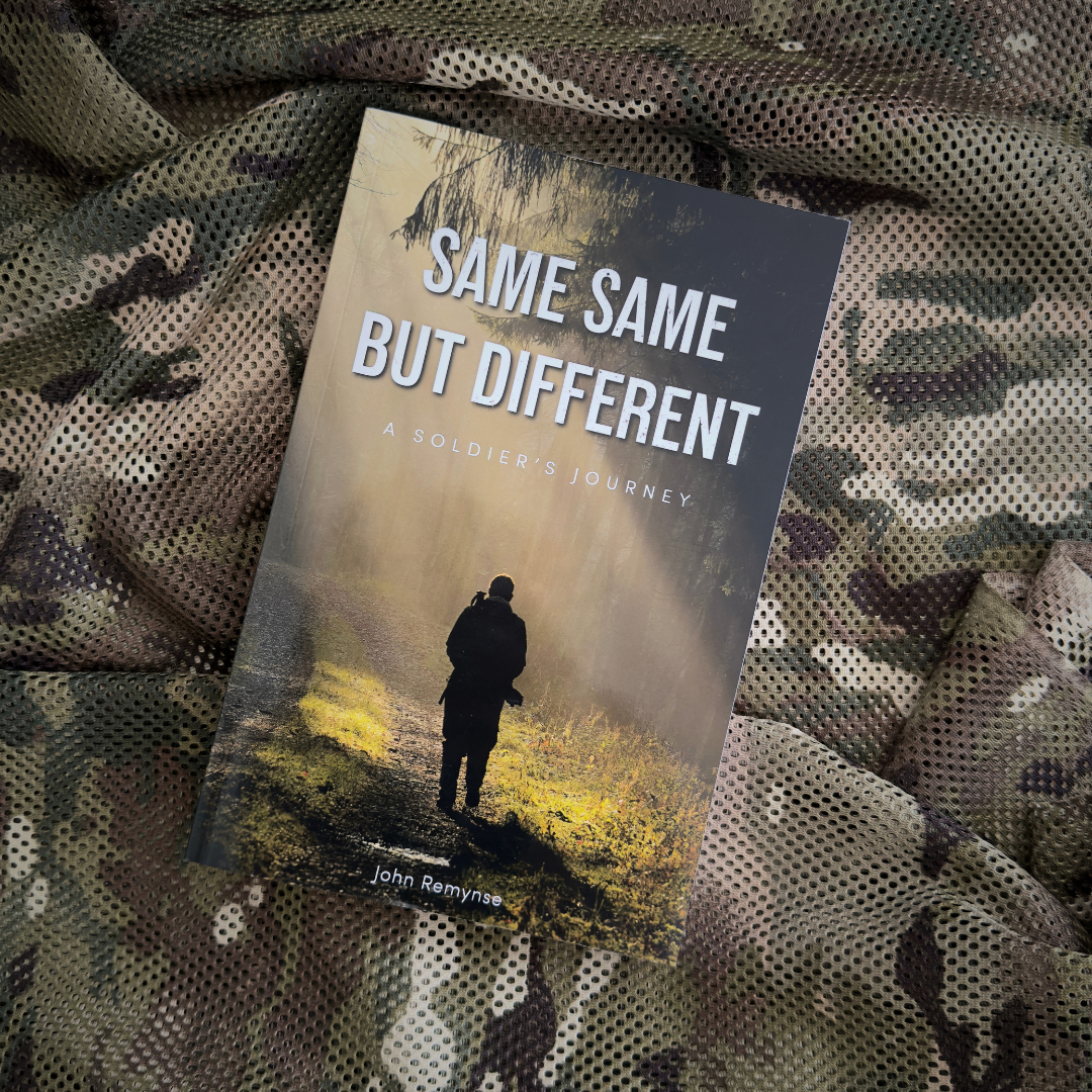 Same Same But Different book by John Remynse showcasing a soldier on a journey in a serene forest setting