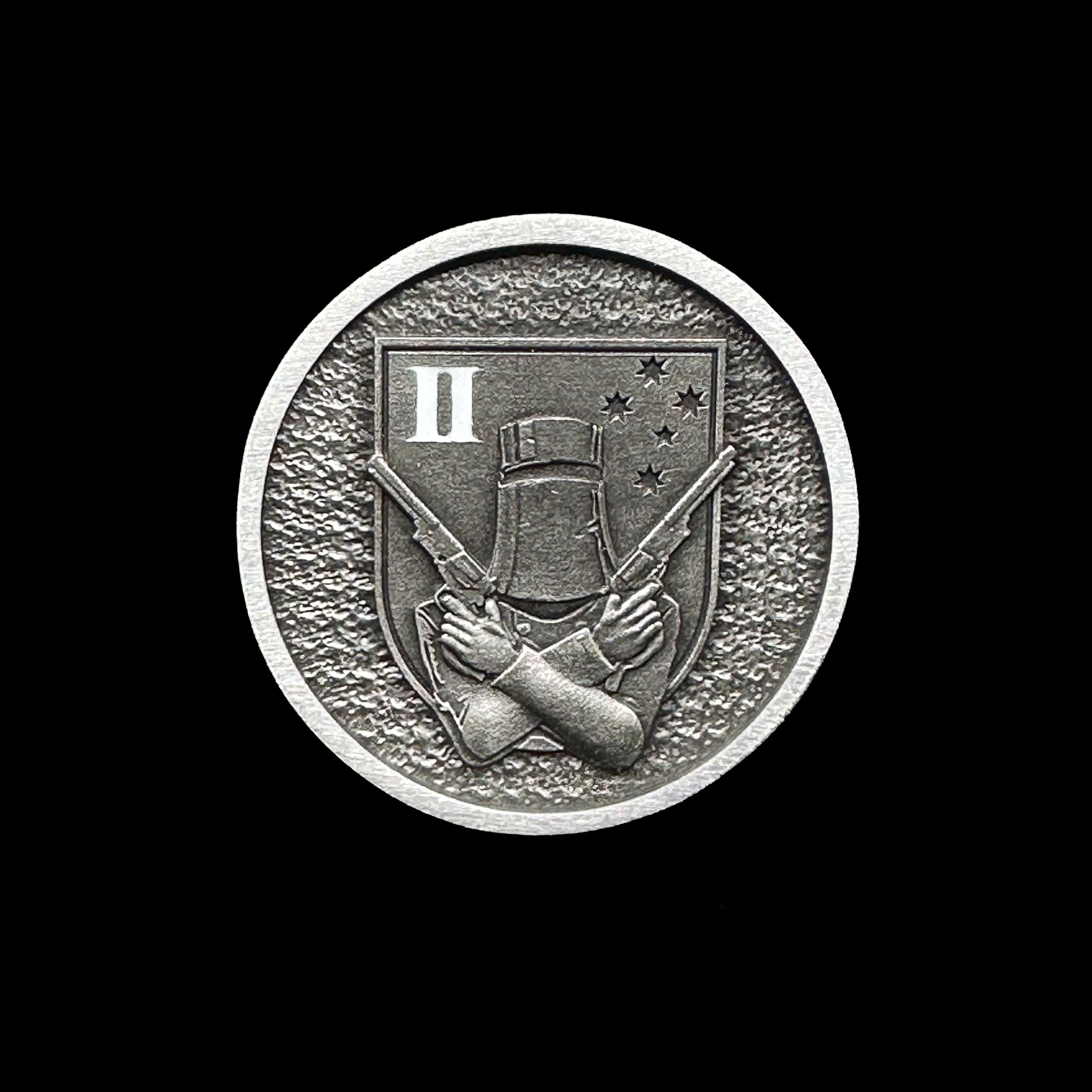 ninesixfour metal challenge coin with crossed pistols and helmet emblem on textured background