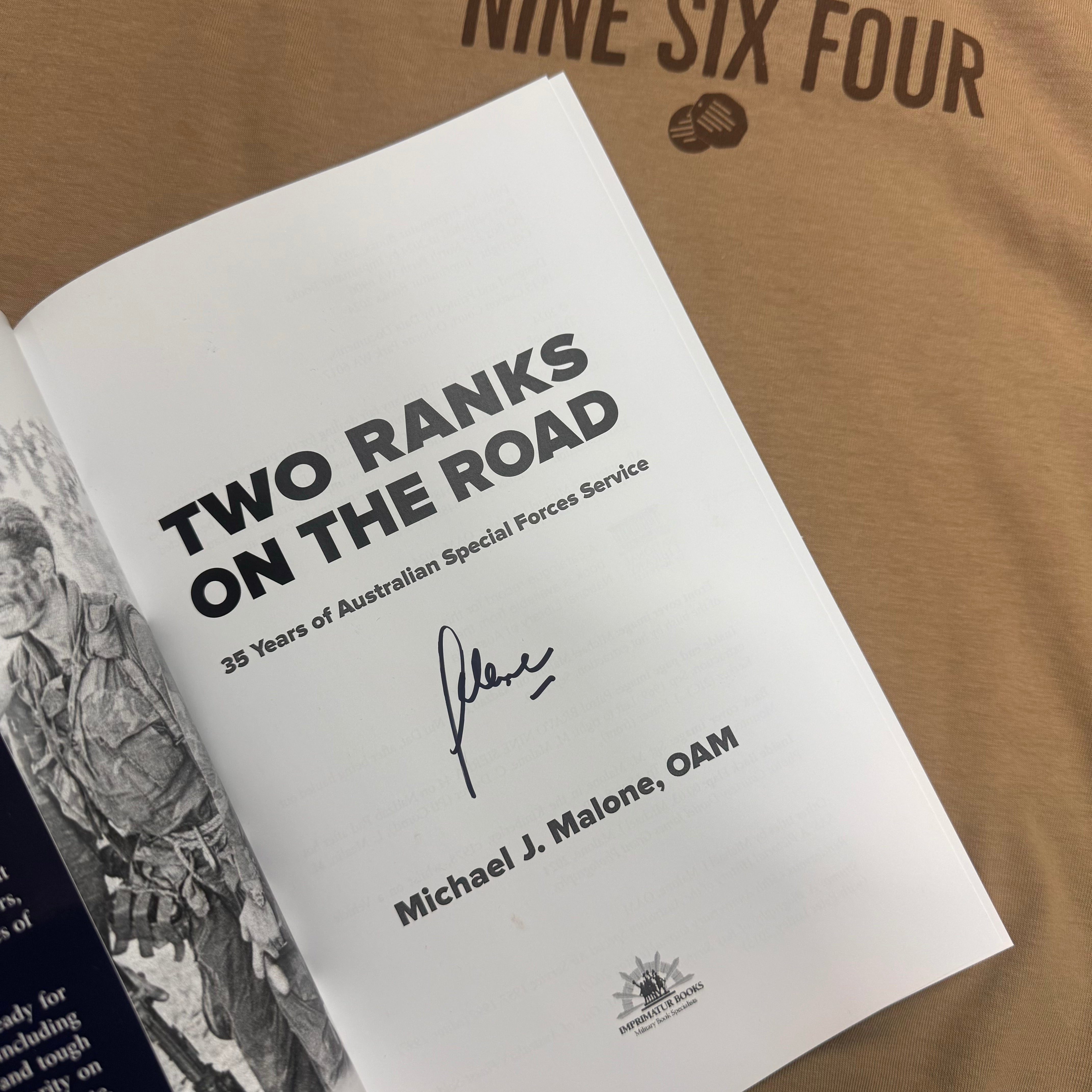 Two Ranks on the Road signed edition book open showing title and author signature on page