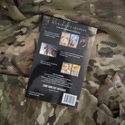 Back cover of A Soldier's Journey book by ninesixfour with camouflage background and images.